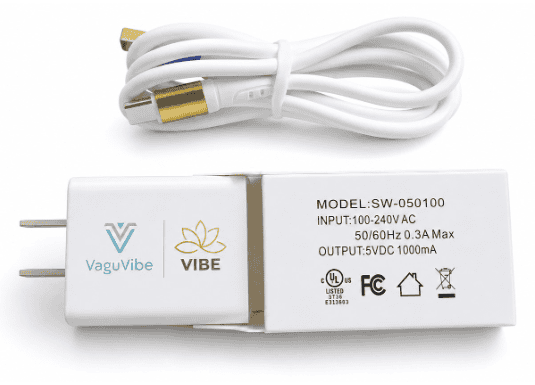 The Resona Health adapter and cable: a white USB wall adapter marked MODEL SW-050100, OUTPUT 5VDC 1000mA, with UL and FCC marks, beside a white round cable with gold metal tips.